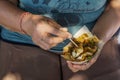 woman's hand holding Balinese food.