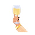 A woman\'s hand holding a champagne glass