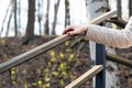 woman& x27;s hand holding the handrail of the stairs in the park Royalty Free Stock Photo