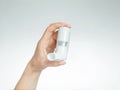 Woman`s hand holding a medical asthma inhaler. Royalty Free Stock Photo