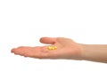 Woman's hand holding pills Royalty Free Stock Photo