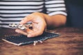 A woman`s hand holding and playing fidget spinner