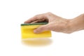 Woman`s Hand Holding A Yellow And Green Dish Sponge