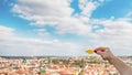 Woman`s hand holding yellow leaf on the Wurzburg town background. Bavaria, Germany. Panorama Royalty Free Stock Photo