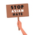 Woman`s hand holds a banner with the message: Stop Asian Hate. A symbol of protest against racism. Vector flat illustration