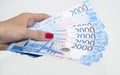 A woman`s hand holds paper money. Russian rouble Royalty Free Stock Photo