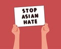 Woman`s hand holds a white banner with the message: Stop Asian Hate. A symbol of protest against racism. Vector flat illustration