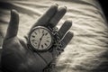 Woman`s Hand with an Old Pocket Watch Royalty Free Stock Photo