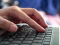 Woman`s hand is pressing the keyboard,Work form home during the virus epidemic