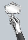 Woman`s hand with a retro mirror