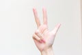 WomanÃ¢â¬â¢s hand shows up three fingers as number three on white background Royalty Free Stock Photo