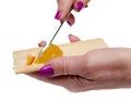 Woman's hand spreading orange marmalade on a toast Royalty Free Stock Photo