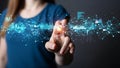 Woman\'s hand touching a glowing blue digital network interface with data charts and connections Keywords: technology Royalty Free Stock Photo