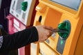 Woman`s hand using Credit Card to withdrawing or transfer money from Atm machine.Finance, money, bank concept Royalty Free Stock Photo