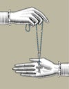 Woman`s hands with catholic prayer beads