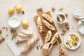 Woman`s hands cooking sweet open sandwiches with ricotta cheese, fresh pears, walnuts and honey on kitchen table for breakfast Royalty Free Stock Photo