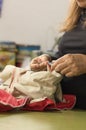 Woman's hands crafting fabric in sewing workshop Royalty Free Stock Photo