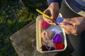 The woman`s hands are crocheting  an Amigurumi doll. Royalty Free Stock Photo