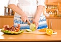 Woman's hands cutting apple Royalty Free Stock Photo