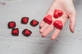 Woman's hands full of chocolate sweets Royalty Free Stock Photo