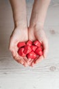 Woman's hands full of chocolate sweets Royalty Free Stock Photo