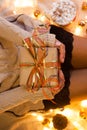 Woman`s hands hold christmas or new year decorated gift box. New Year`s concept.selective focus Royalty Free Stock Photo