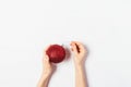 Woman's hands holding Christmas ball toy Royalty Free Stock Photo
