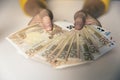 Woman`s hands holding European Euro bills. Cash, wealth, money c