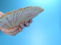 Woman`s hands holding many Russian ruble five thousand banknotes, side view Royalty Free Stock Photo