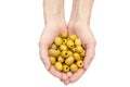 Woman`s hands holding olives in palms. Isolated on white Royalty Free Stock Photo