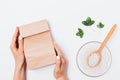 Woman's hands holding paper bag Royalty Free Stock Photo