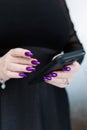 Woman's hands holding a smartphone Royalty Free Stock Photo