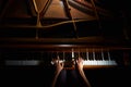 Woman's hands on the keyboard of the piano in night closeup