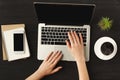 Woman`s hands on laptop keyboard, top view Royalty Free Stock Photo