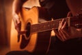 Woman's hands playing acoustic guitar, close up Royalty Free Stock Photo