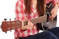 Woman's hands playing acoustic guitar, close up Royalty Free Stock Photo