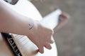 Woman`s hands playing acoustic guitar, close up Royalty Free Stock Photo