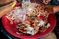 Woman`s hands removing or peeling off crab.