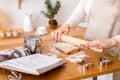 Woman`s hands roll the dough. Protection Symbol, heat comfort Royalty Free Stock Photo