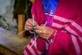 Woman`s hands sewing