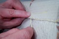 Woman`s Hands Sewing textire. Hobby and work.