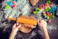 Woman's hands sheeting dough with rolling pin Royalty Free Stock Photo