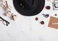 Woman`s hat, glasses, cotton branch and other small objects