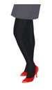 Female legs in black stockings and red shoes Royalty Free Stock Photo