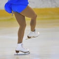 Woman's Legs in White Ice Skates Royalty Free Stock Photo