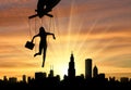 Woman`s marionette against of city