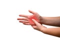 The woman`s palm hurts. A damaged female hand hurts. Hands suffer from work, sports injury. Sore spot is highlighted in red.