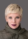 Woman`s portrait blonde. Fashion hairstyle, make-up in grey shades. Royalty Free Stock Photo
