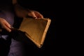 Woman`s reading old holy bible. Royalty Free Stock Photo