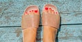 Woman\'s red pedicure, close up